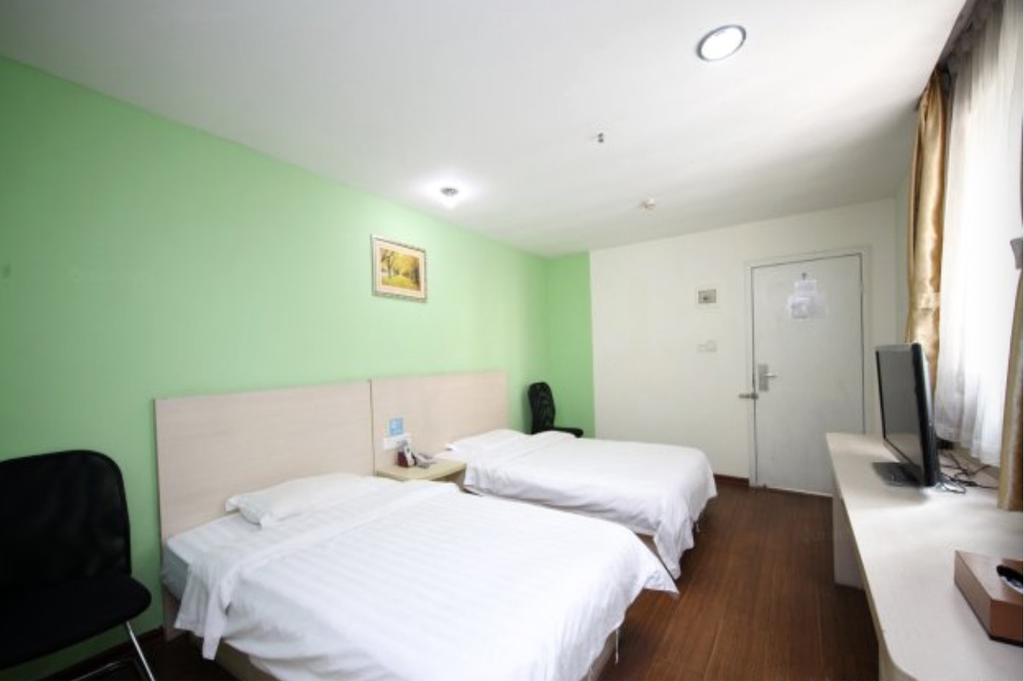 Yixin Business Hotel Guangzhou Bagian luar foto