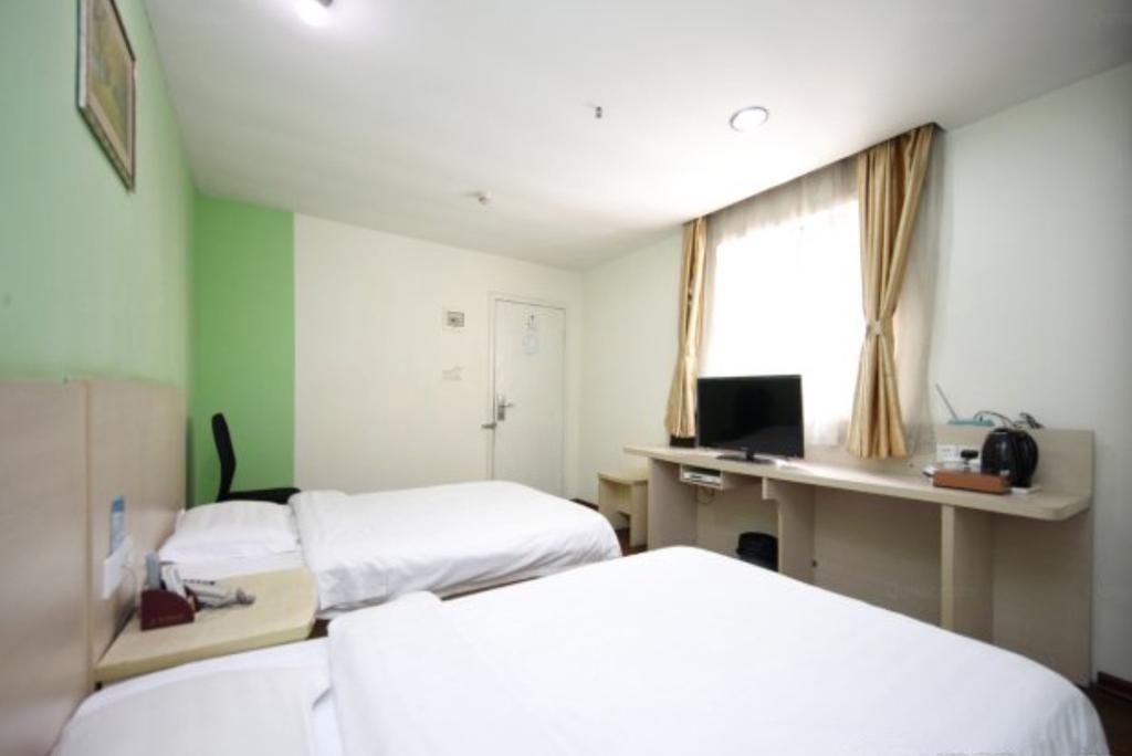 Yixin Business Hotel Guangzhou Bagian luar foto