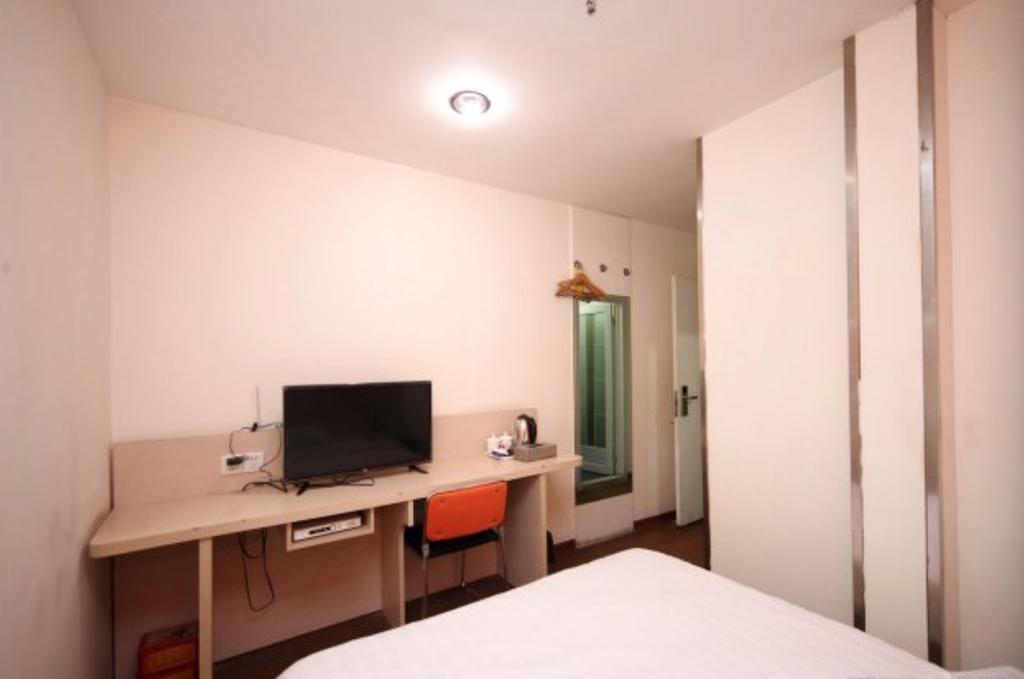 Yixin Business Hotel Guangzhou Bagian luar foto