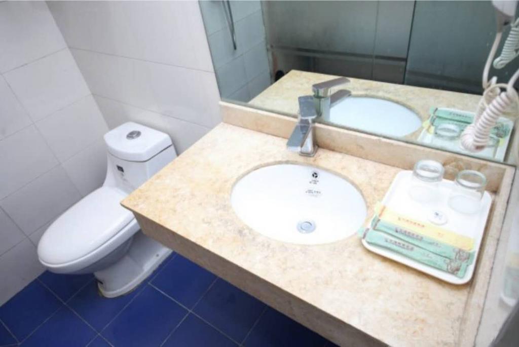 Yixin Business Hotel Guangzhou Bagian luar foto