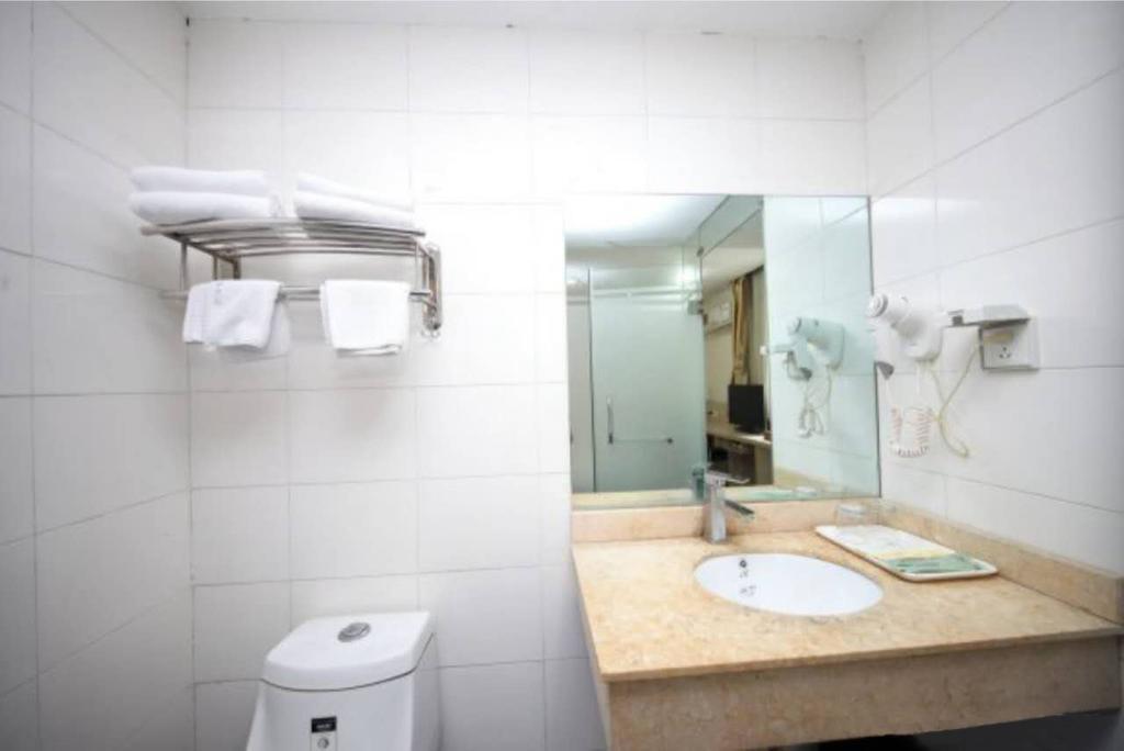 Yixin Business Hotel Guangzhou Bagian luar foto