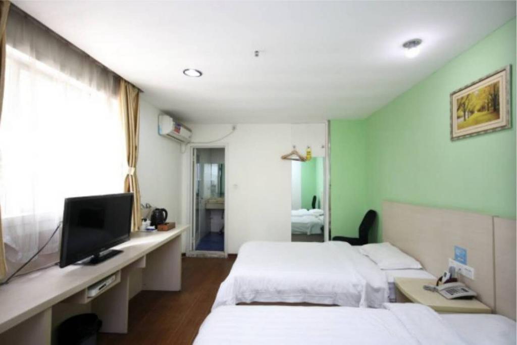Yixin Business Hotel Guangzhou Bagian luar foto