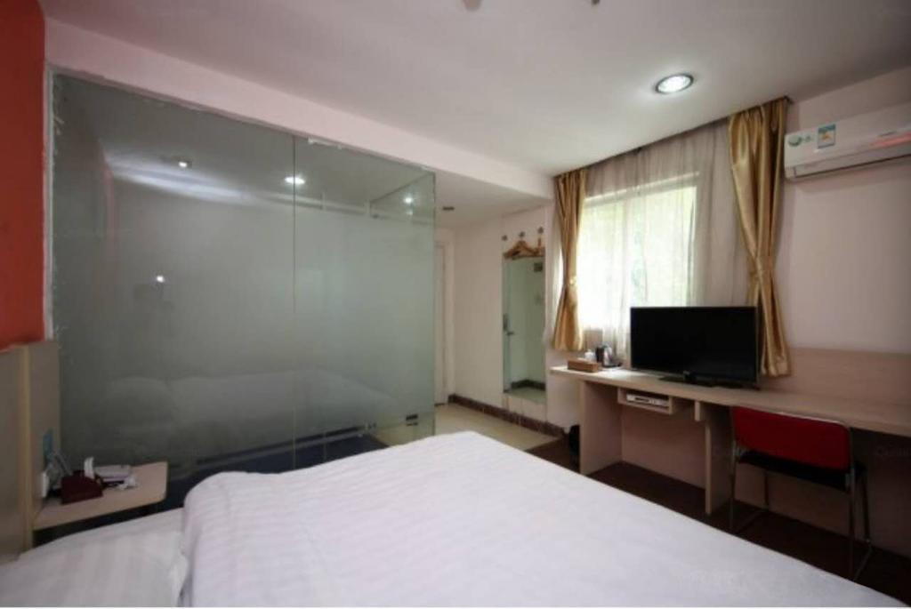 Yixin Business Hotel Guangzhou Bagian luar foto